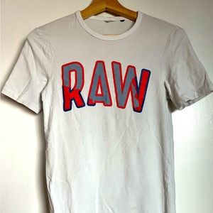 White G-Star t-shirt with Orange & Blue RAW logo. Gently used. Size/ Men’s Small